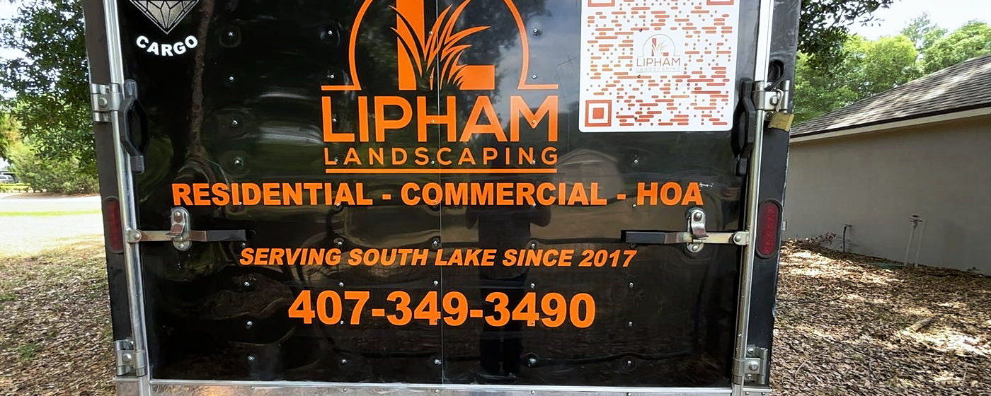 The Lipham Landscaping trailer at a residential job in the Minneola area